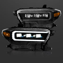 Pair of car headlights on a dark background